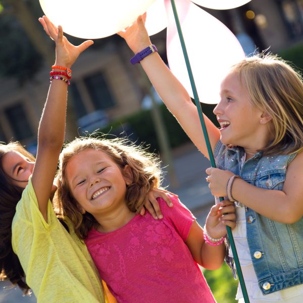 Portrait of group of childrens having fun in the park.